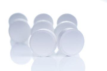 pills and tablets on a background