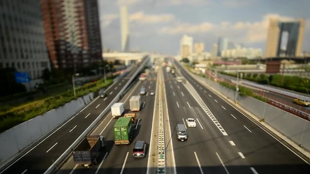 Time Lapse of Traffic on Busy Boulevard from Above - Tokyo Japan 