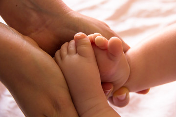Obraz na płótnie Canvas Feet of newborn