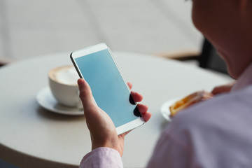 Hand with smartphone