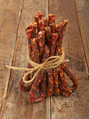 Dry sausage hunting on a wooden table