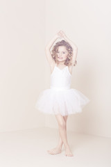 Naklejka premium Young ballerina dancing