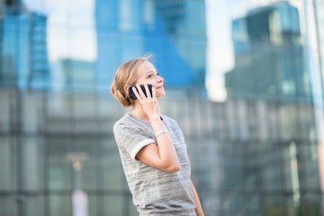 Young business woman speaking on the phone