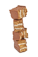 The broken pieces of chocolate biscuit isolated on white