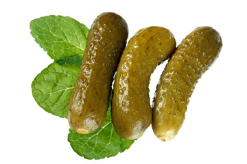 Pickled cucumbers on a white background.