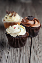 Chocolate cupcake on wooden table