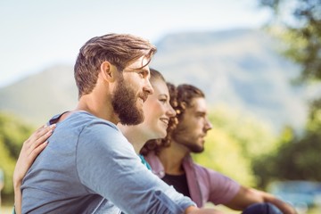 Obraz premium Hipsters sitting on the grass