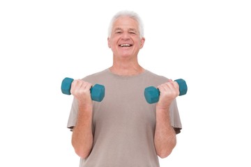 Fototapeta na wymiar Senior man lifting hand weights