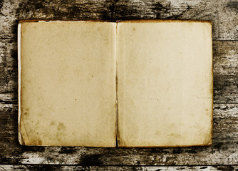 Open Book blank on old wood background