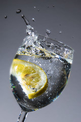 lemon in wather-glas gray backgrund