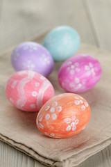 Obraz na płótnie Canvas easter eggs with flowers, handmade painted eggs