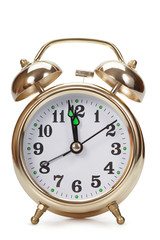 Big gold alarm clock on a white background