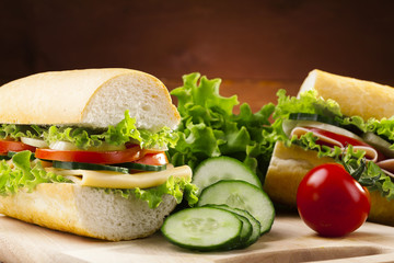 big sandwich with ham, cheese and vegetables