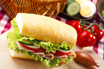 Breakfast sandwich with vegetables.