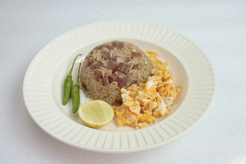 Fried rice with sausage and fried egg
