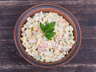 Russian traditional salad olivier with pea