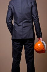 Men in suit with safety helmet