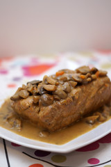 Arrosto di maiale con crema di funghi