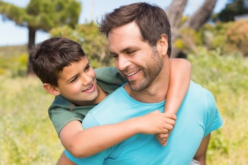 Fototapeta premium Father and son in the countryside