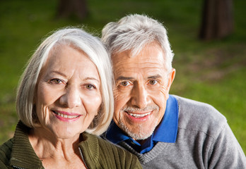 Happy Senior Couple At Campsite
