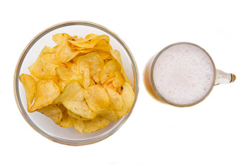 Beer mug with chips on a white background seen from above