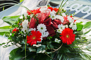 bouquet on wedding car