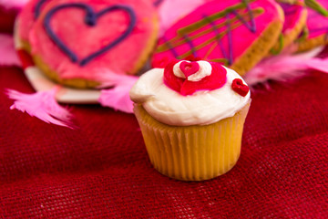 Valentines Day - pink cookies and cupcakes with hearts