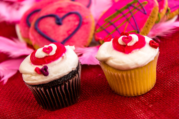 Valentines Day - pink cookies and cupcakes with hearts