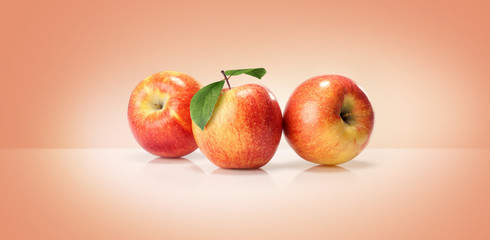 yellow red apples isolated on a colored background