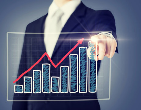 businessman hand with chart on virtual screen