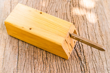 wooden knife block on wooden background