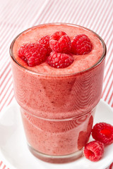 glass of raspberry and banana smoothie