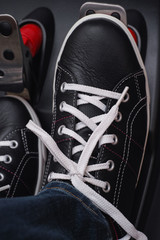 Foot pressing the gas pedal