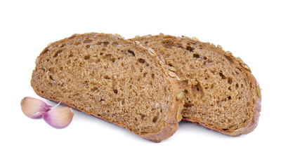 Grain bread and garlic isolated on white background.