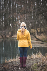 Woman enjoying lake view in the forest