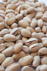 Close up of fresh pistachios. Whole background.