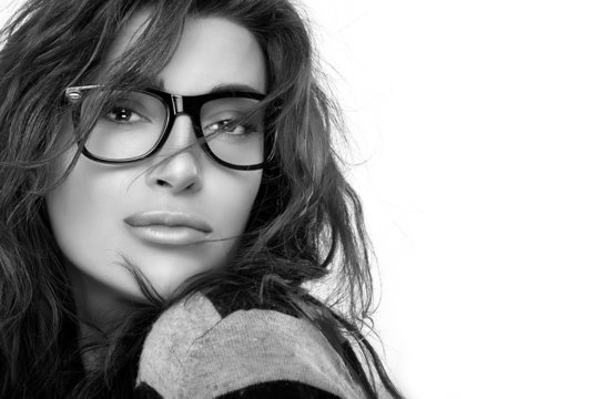 Cool Trendy Eyewear Portrait. Beauty Young Woman in Glasses.