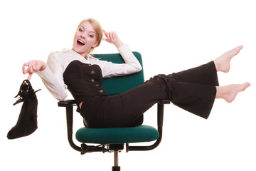Break from work. Businesswoman relaxing on chair.