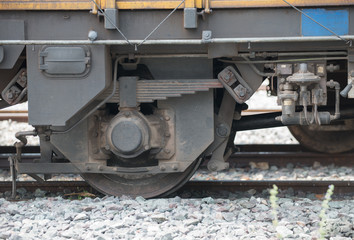 Fototapeta na wymiar closeup wheel break and suspension system of diesel train