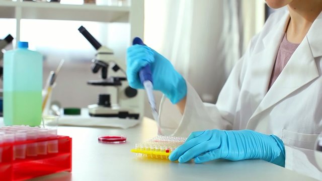 Woman technician in the genetics laboratory
