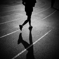 silhouette man jogging and running on track