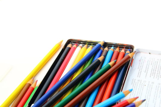 Color pencils isolated over white background