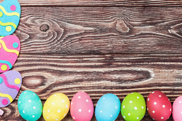 Easter eggs on wooden background