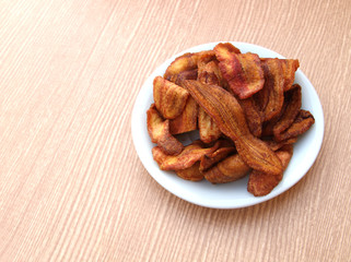 banana thai snack crisp in white plate