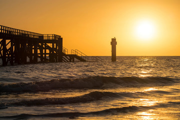 estacade et lever du soleil
