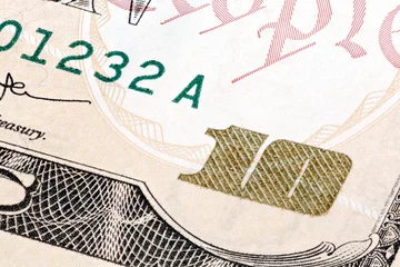 Selbstklebende Fototapeten Detail of 10 dollars bill. Extreme macro shot. © Dmytro Synelnychenko