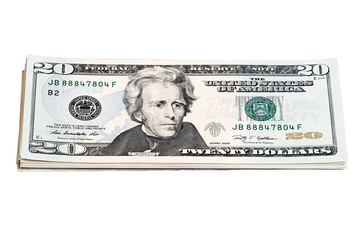 Stack of 20 Dollar Bills isolated on white.