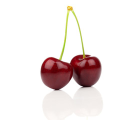 Two heart shaped cherry berries isolated on white background cut