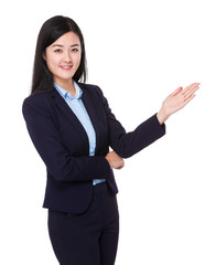 Businesswoman with hand presentation