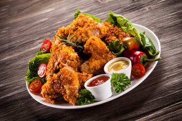 Fried chicken nuggets and vegetables